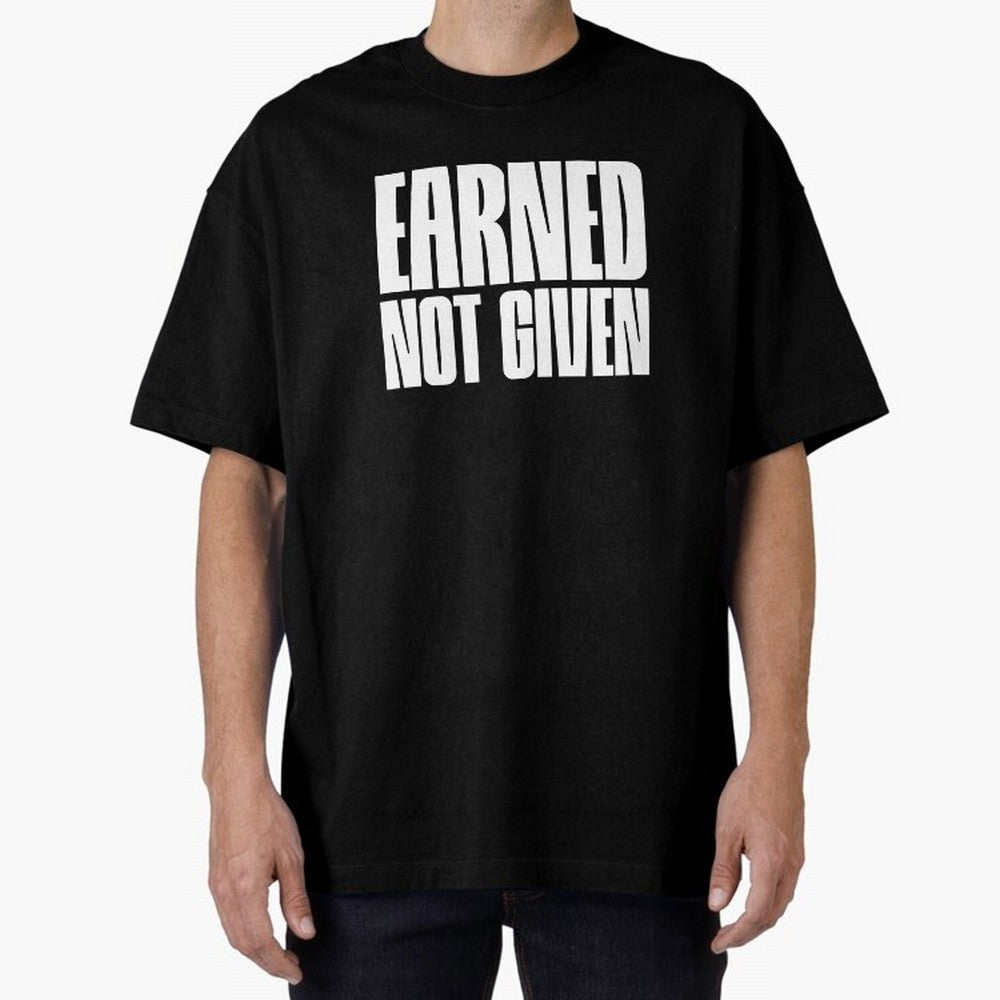 Earned not given white Oversized T-Shirt Follow the Final Road of Global Football Passion for FIFA World Cup 2026 Group Stage, Built around Cristiano Ronaldo, Haaland and CR7, Brazil, Football History, Final Match Energy, Crowd Noise and Once in a