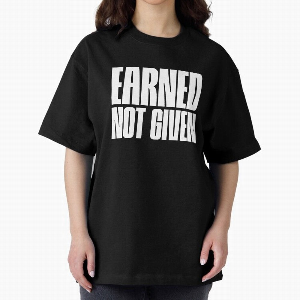 Earned not given white Oversized T-Shirt Follow the Final Road of Global Football Passion for FIFA World Cup 2026 Group Stage, Built around Cristiano Ronaldo, Haaland and CR7, Brazil, Football History, Final Match Energy, Crowd Noise and Once in a